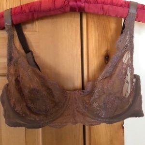 Victoria Secret bra! A sexy coffee colored brown . The cut is demi style .